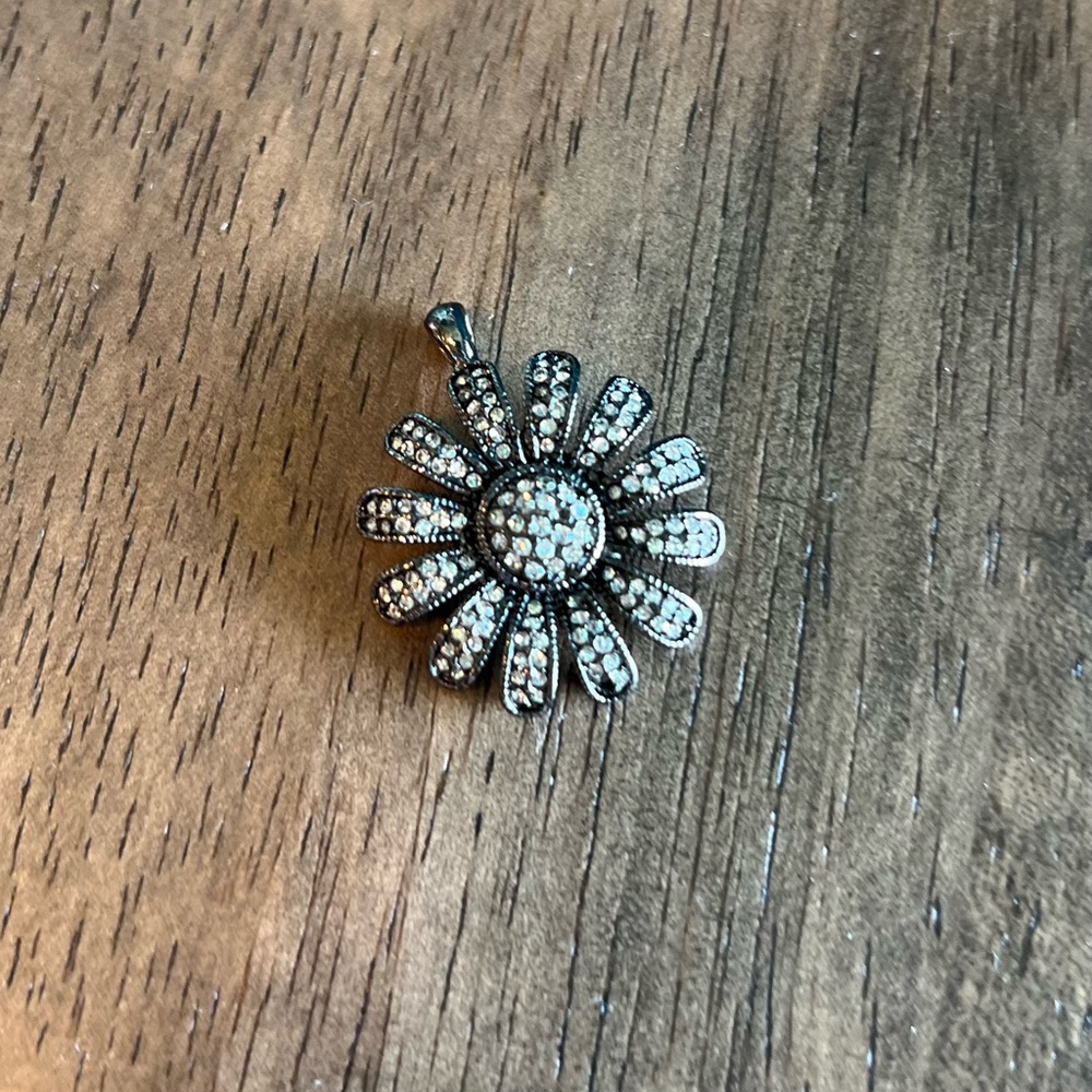 Jeweled daisy pendant necklace charm encrusted with crystals. Very sparkly!